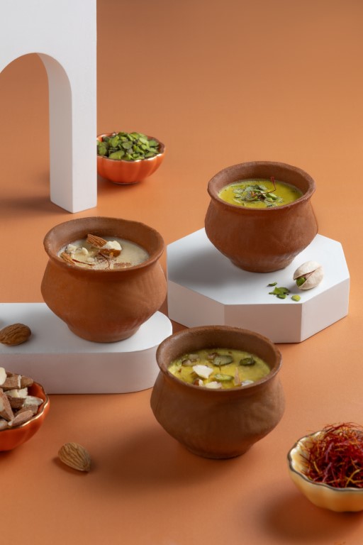 Traditional kulfi served in a terracotta matka